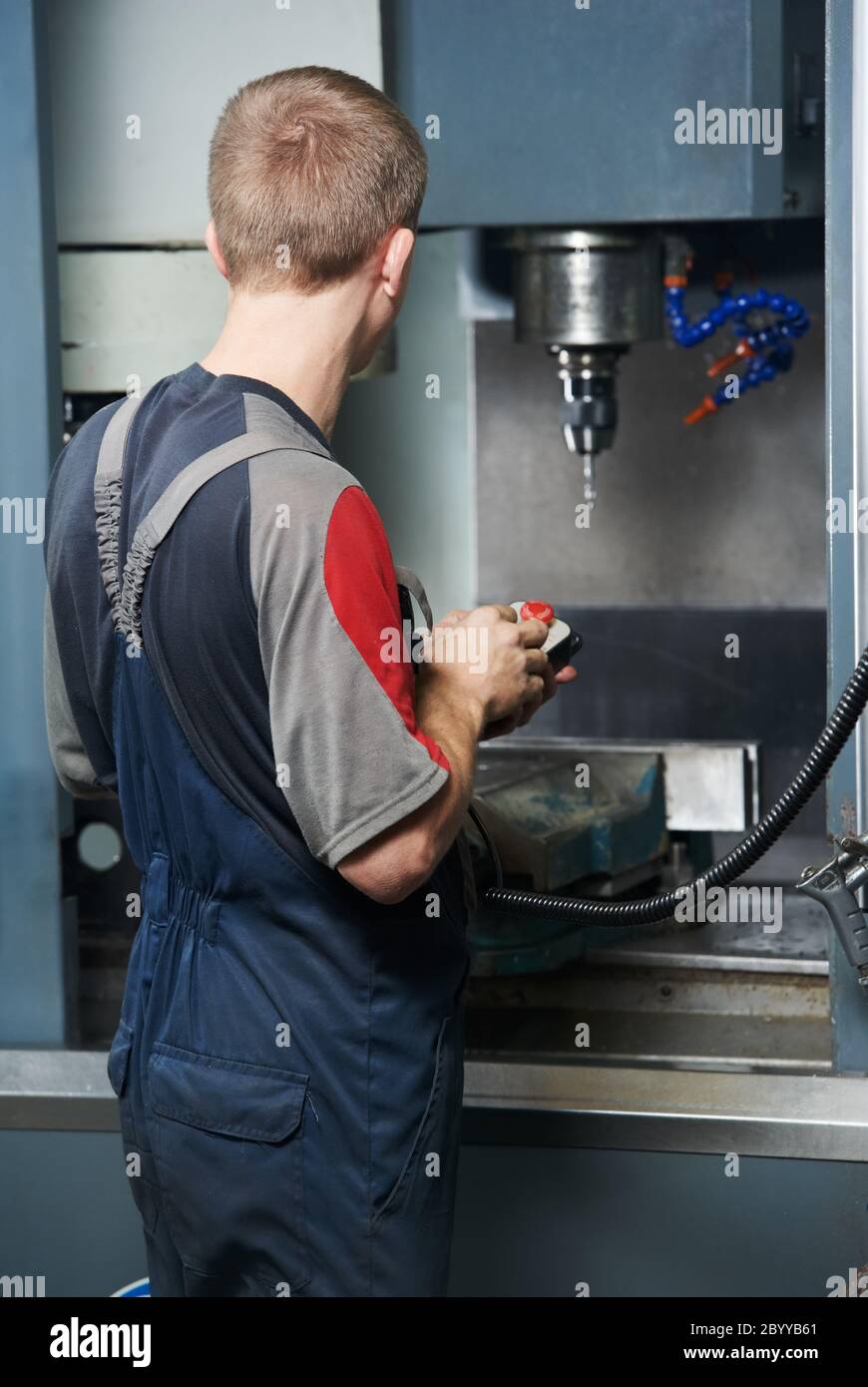 worker at machining tool workshop Stock Photo