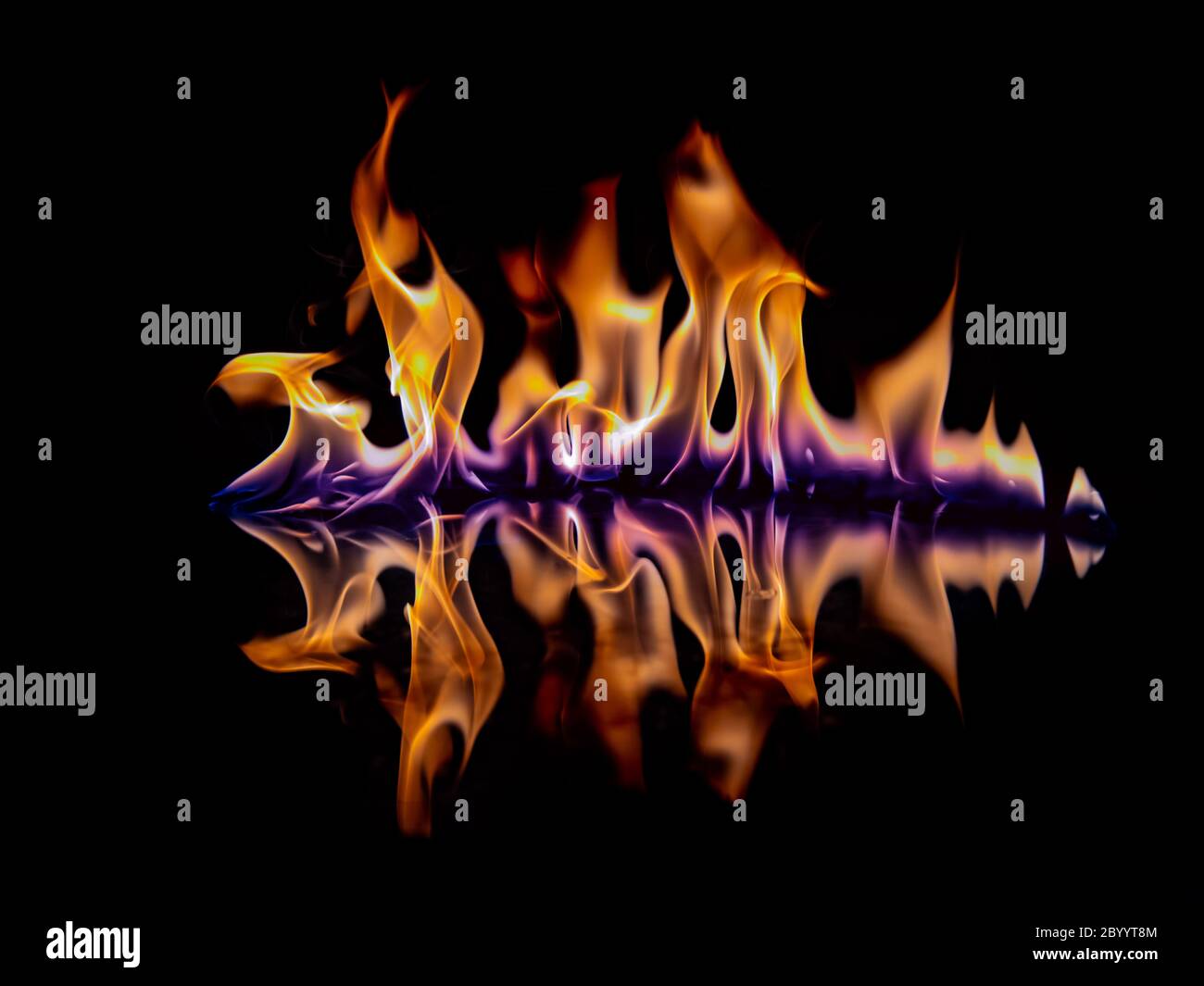Beautiful flame with reflection on a black background Stock Photo - Alamy