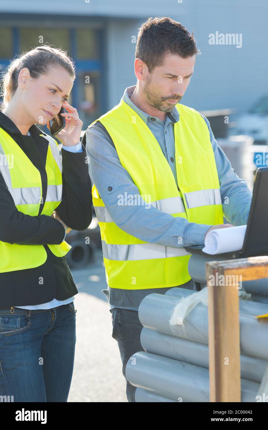 Wearing high visibility vests hi-res stock photography and images - Alamy