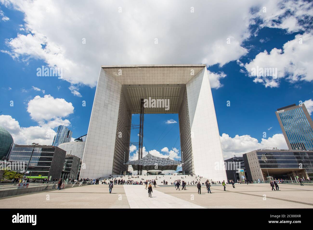 PARIS - MAY 15: Tourists walking in the central square of La Defense a major business district of Paris, on May 15 2014 in Paris Stock Photo