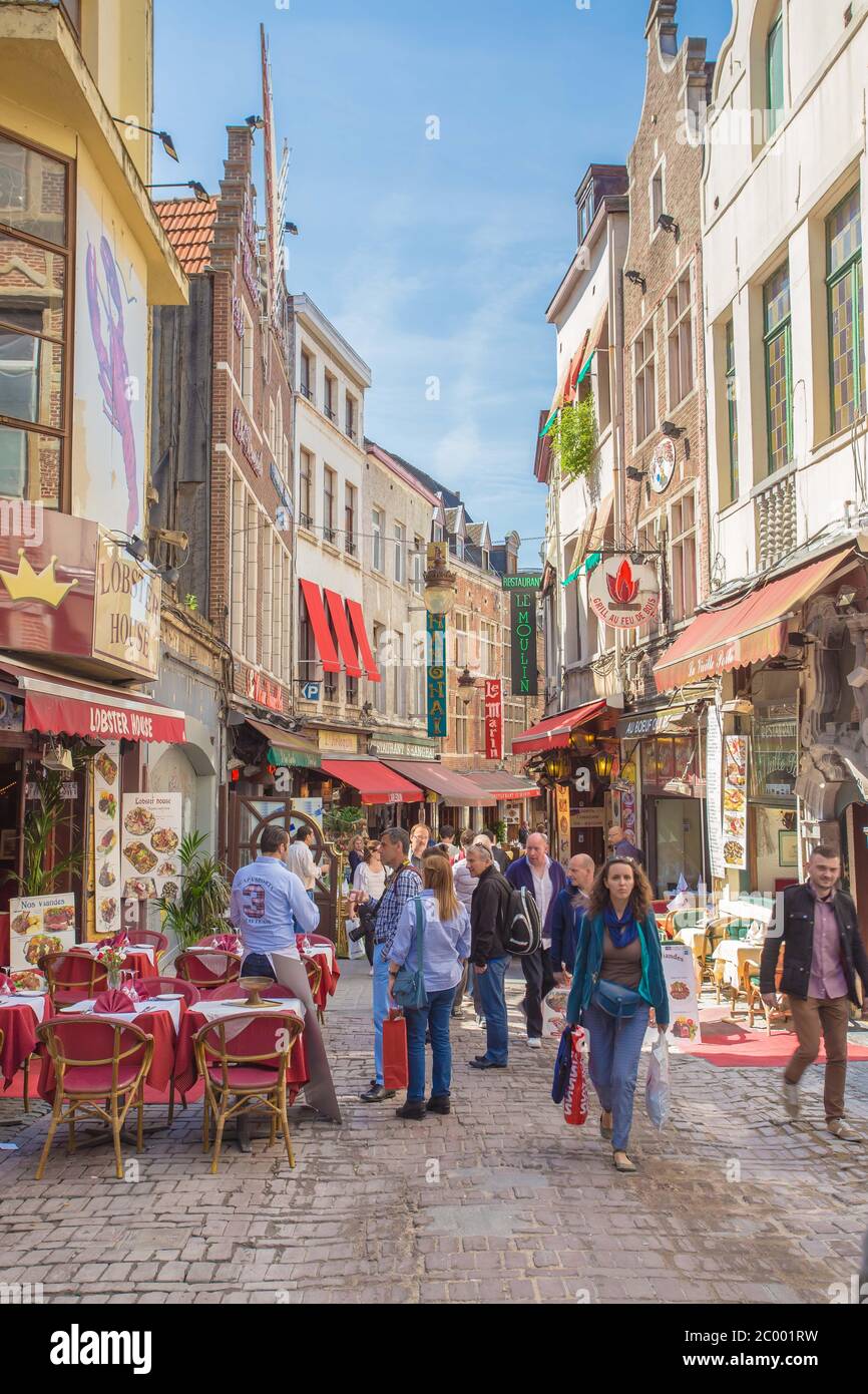 BRUSSELS, BELGIUM-MAY 16, 2014: Restaurants in historical centre of Brussels are ready to accept first visitors of the day. Stock Photo