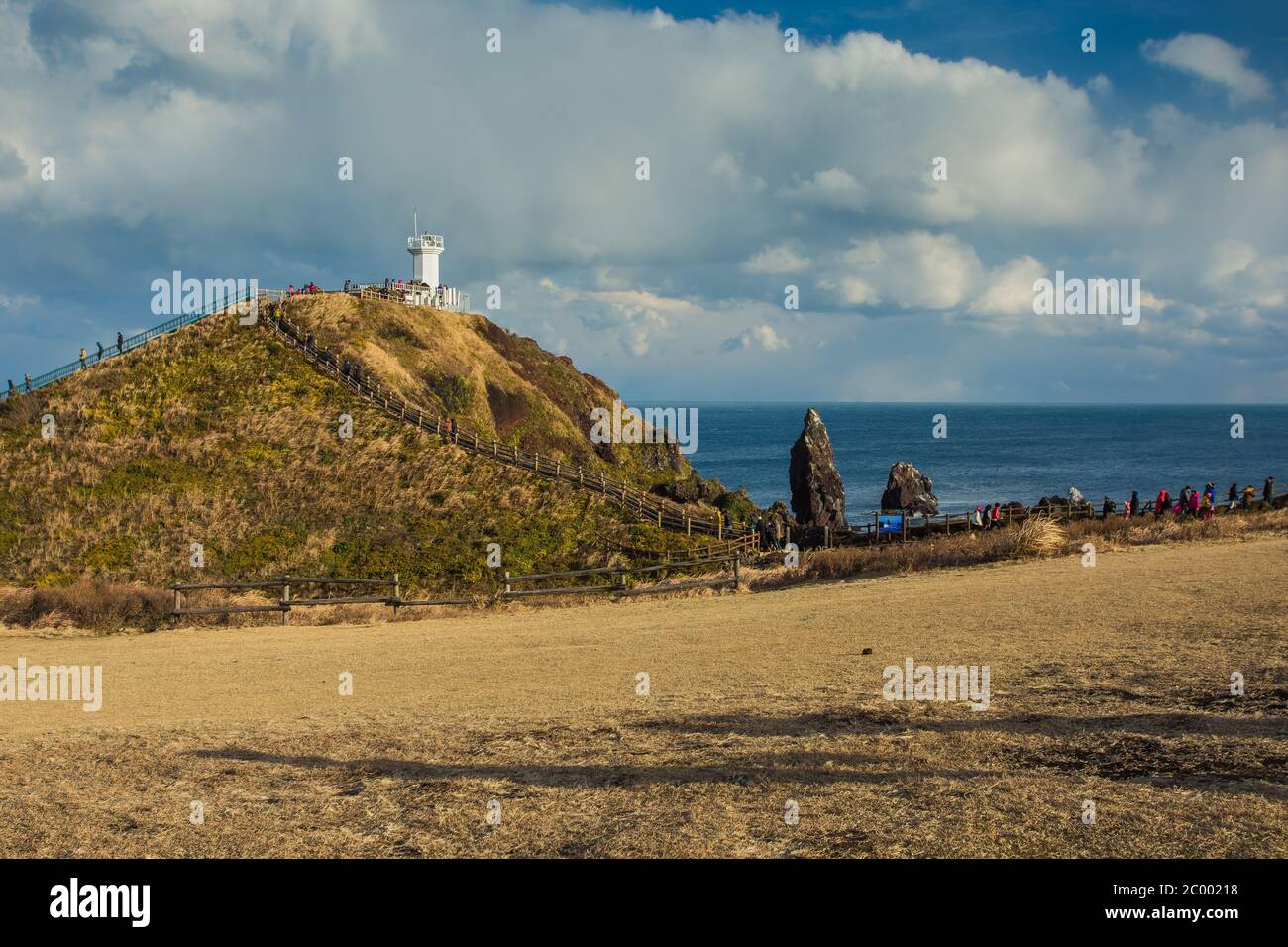 Lighthouse in Seopjikoji Mount Jeju Island , South Korea Stock Photo