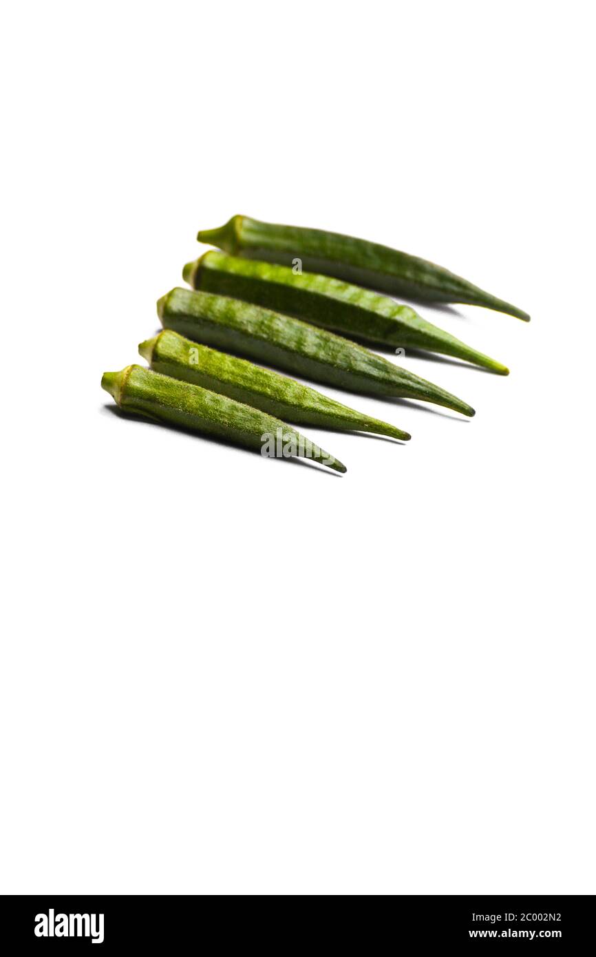 Fresh young okra or ladyfinger isolated on white background Stock Photo