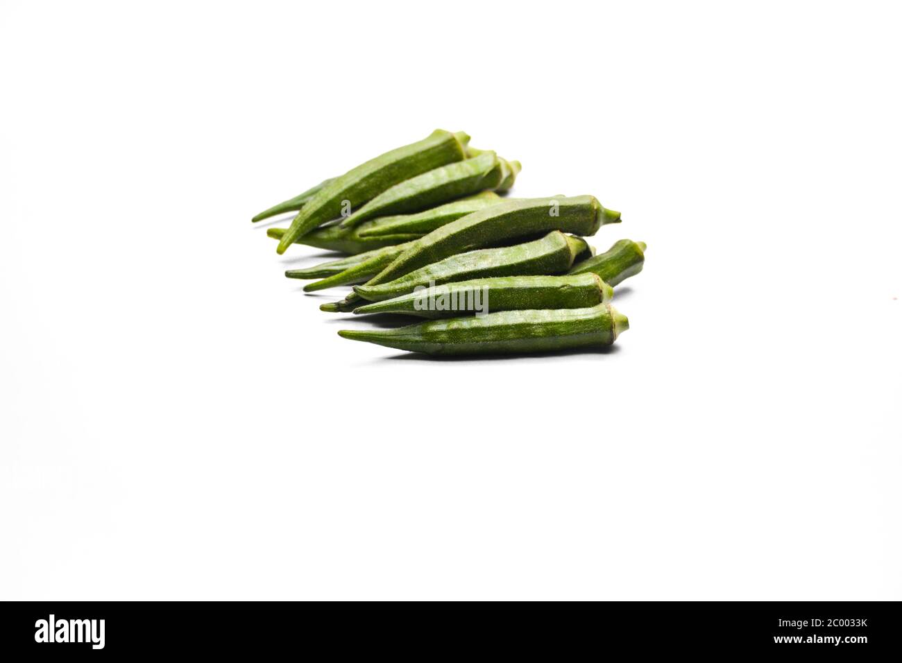 Fresh young okra or ladyfinger isolated on white background Stock Photo