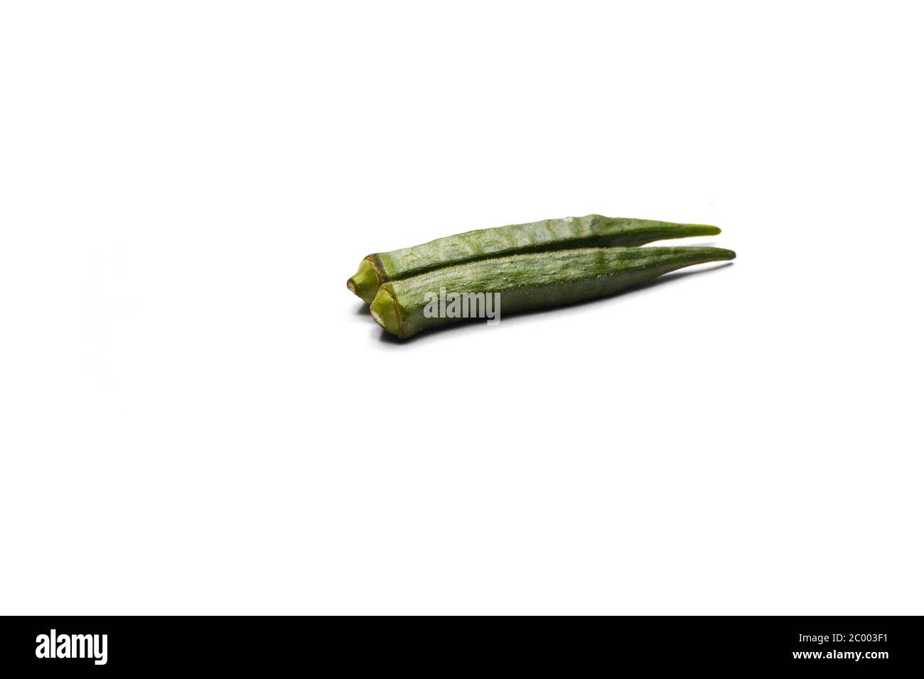 Fresh young okra or ladyfinger isolated on white background Stock Photo