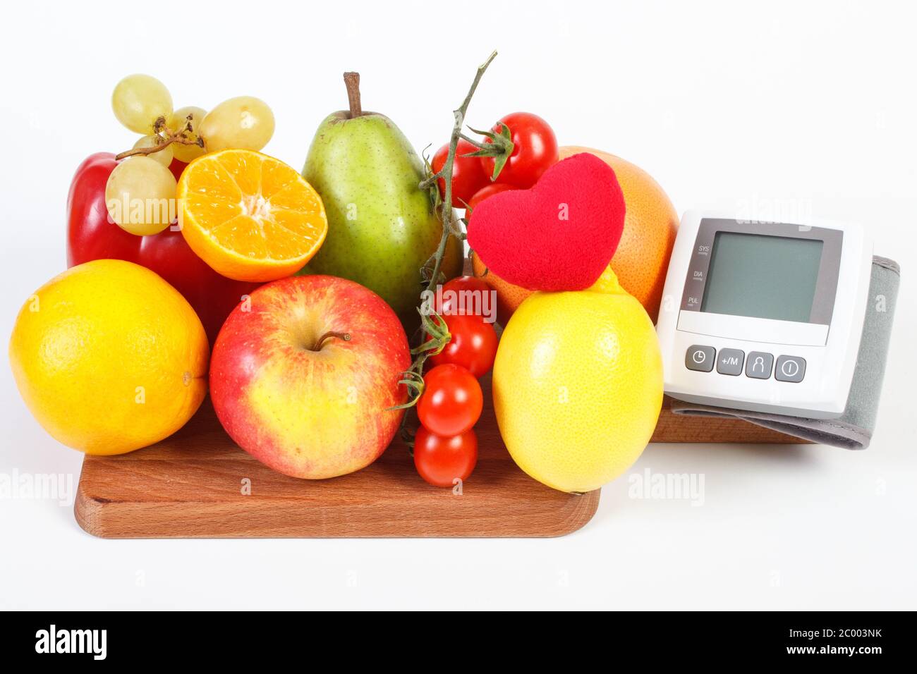 Blood pressure monitor and fruits with vegetables, healthy lifestyle ...