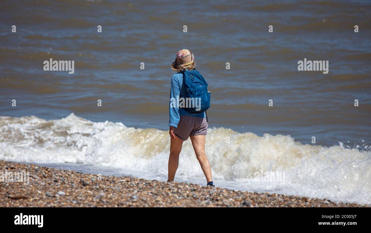 Hiking woman backpack hat walks hi-res stock photography and images - Alamy
