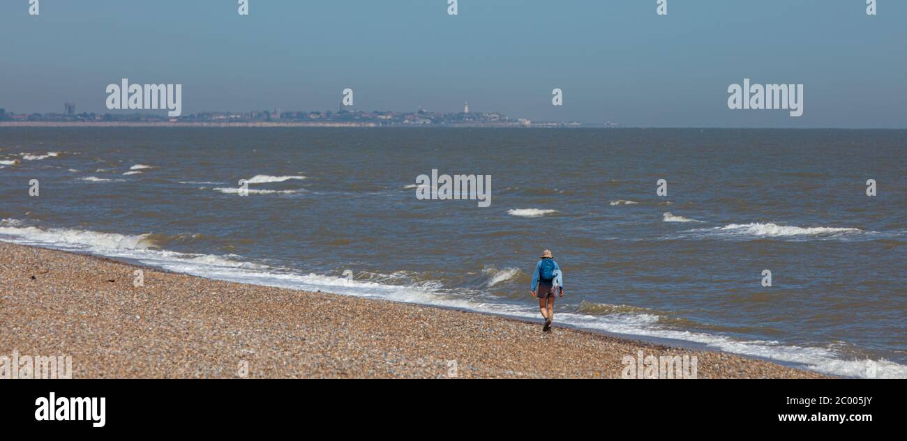 Hiking woman backpack hat walks hi-res stock photography and images - Alamy
