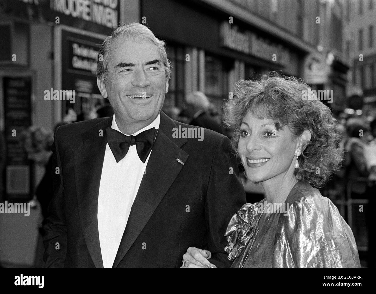 LONDON, UK. July 1980: Actor Gregory Peck & wife Veronique Peck at the premiere of 'Sea Wolves' in London. © Paul Smith/Featureflash Stock Photo