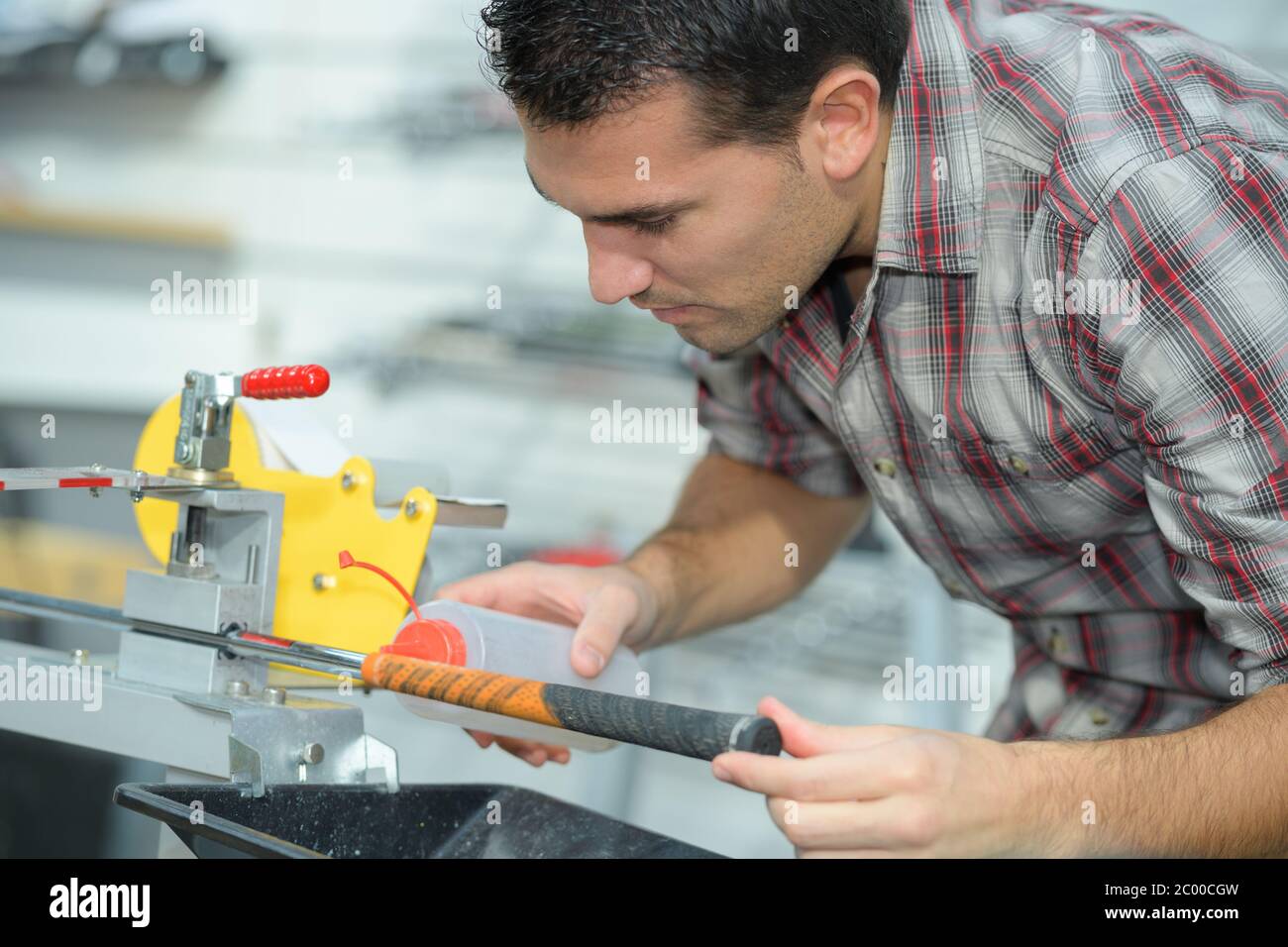 an engineer lubricating the equipment Stock Photo Alamy