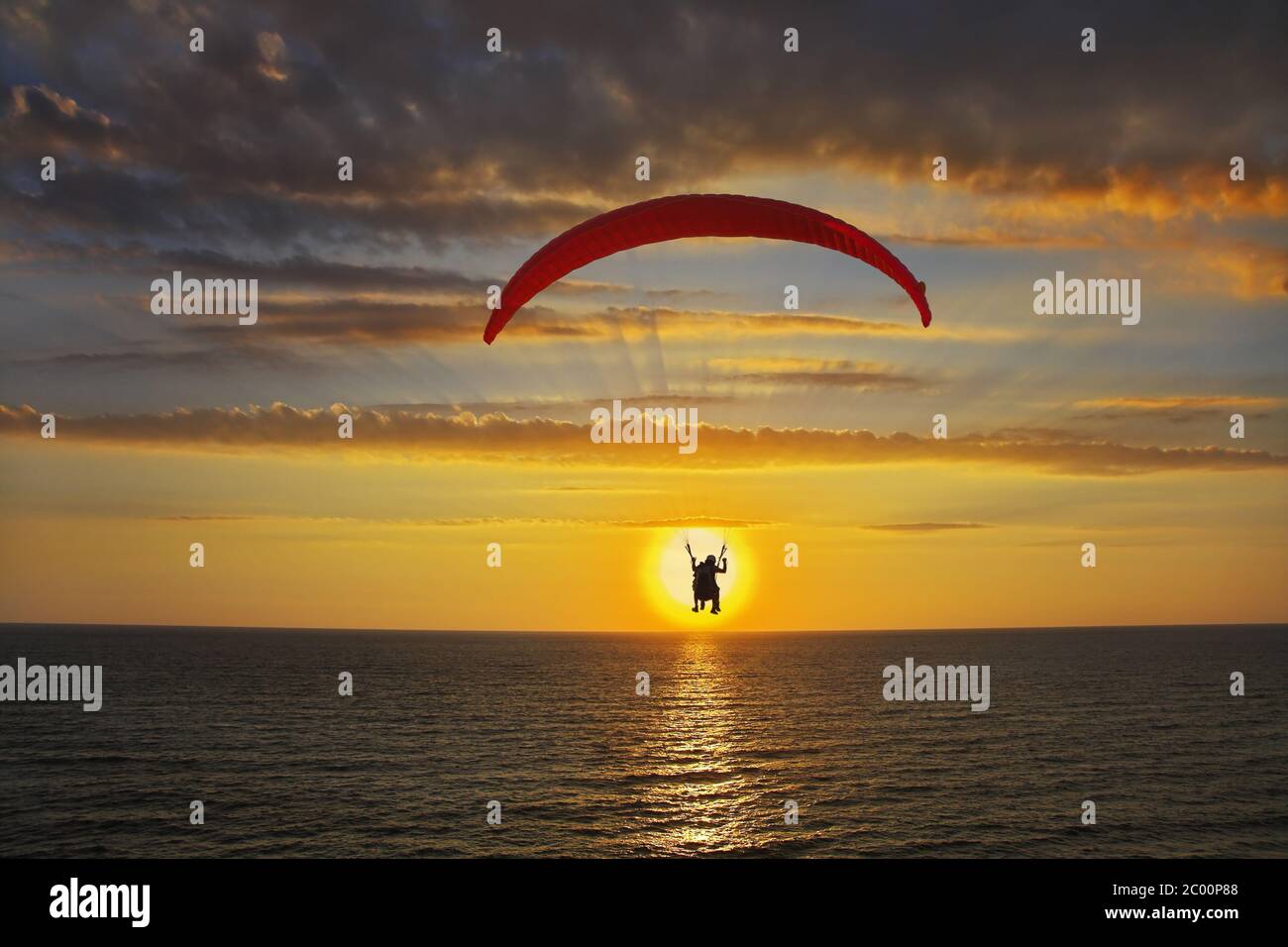 Operated parachute above the sea Stock Photo