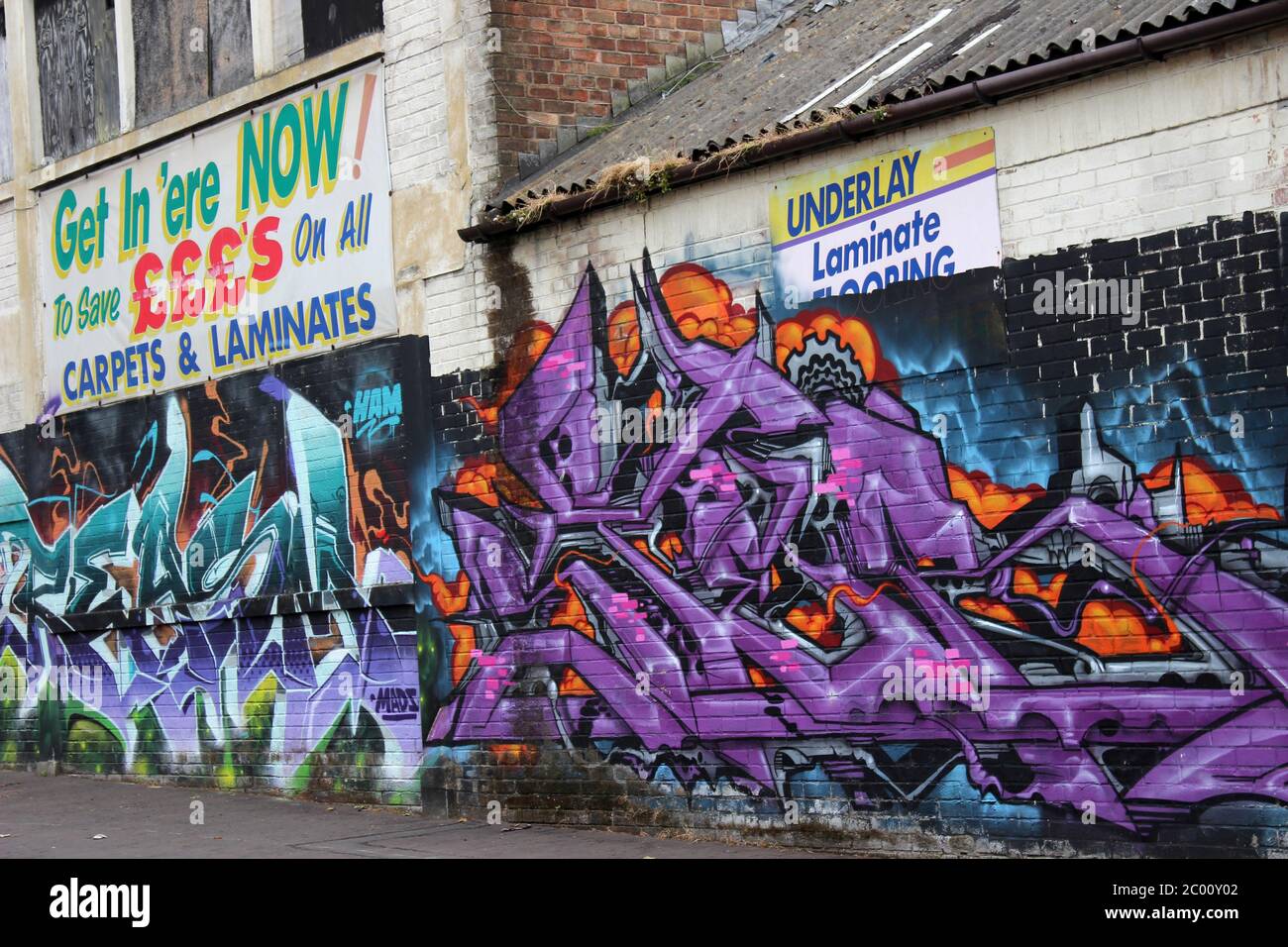 Urban Graffiti On Disused Carpet Warehouse Stock Photo