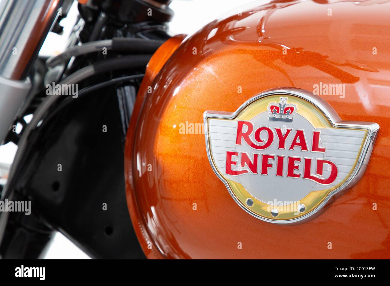 Bordeaux , Aquitaine / France - 06 01 2020 : Royal Enfield logo sign on motorcycle fuel tank orange color of vintage indian motorbike Stock Photo