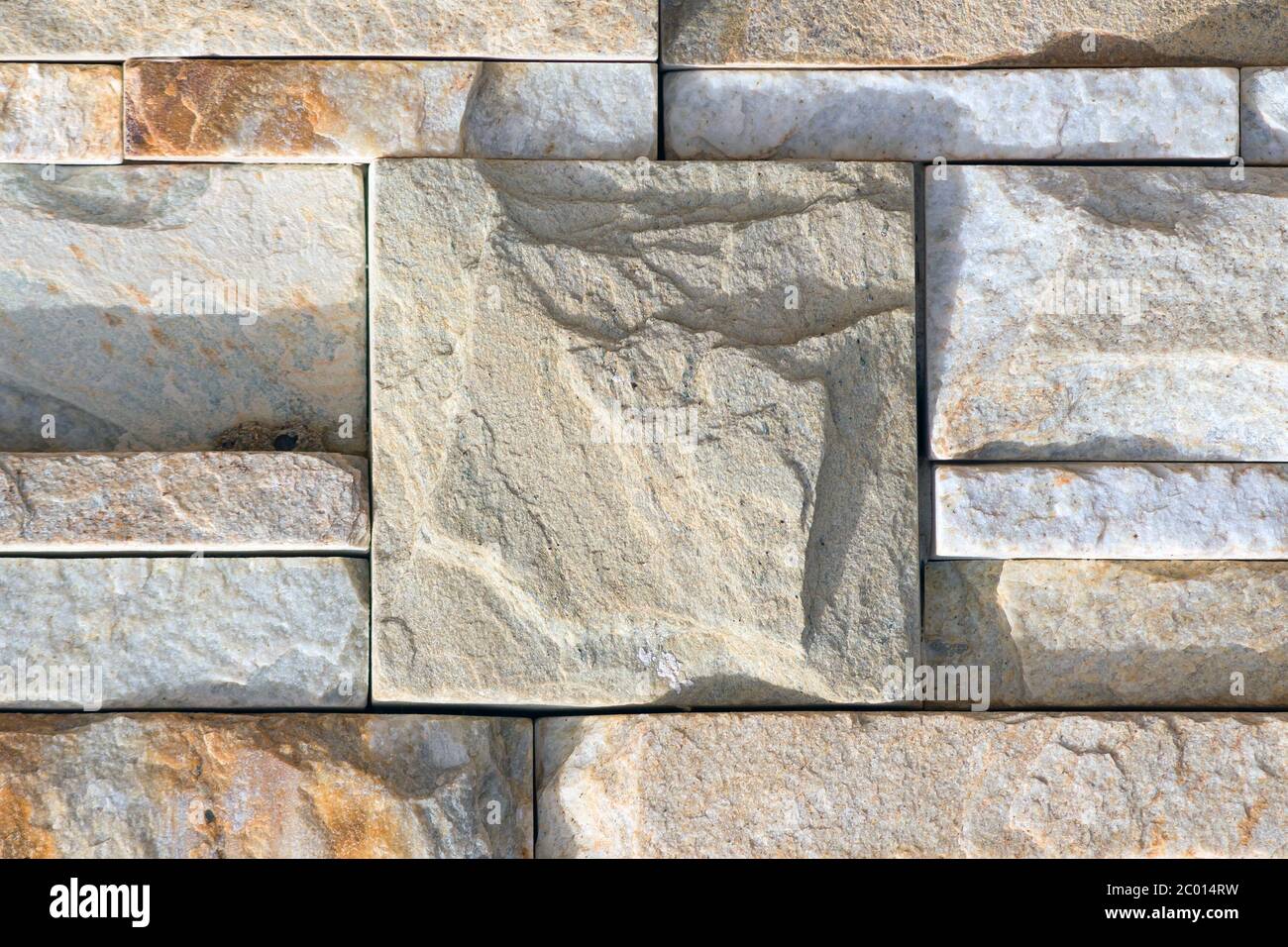 Center cuboid in a stone wall Stock Photo
