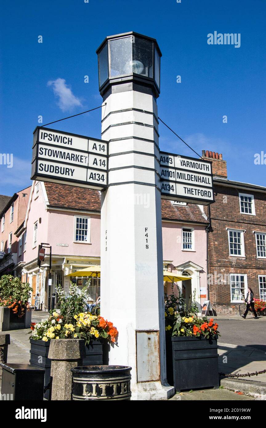 Bury St Edumnds, UK - September 19, 2011:  An historic art deco sign post in the middle of Bury St Edmunds showing the direction of a number of East A Stock Photo