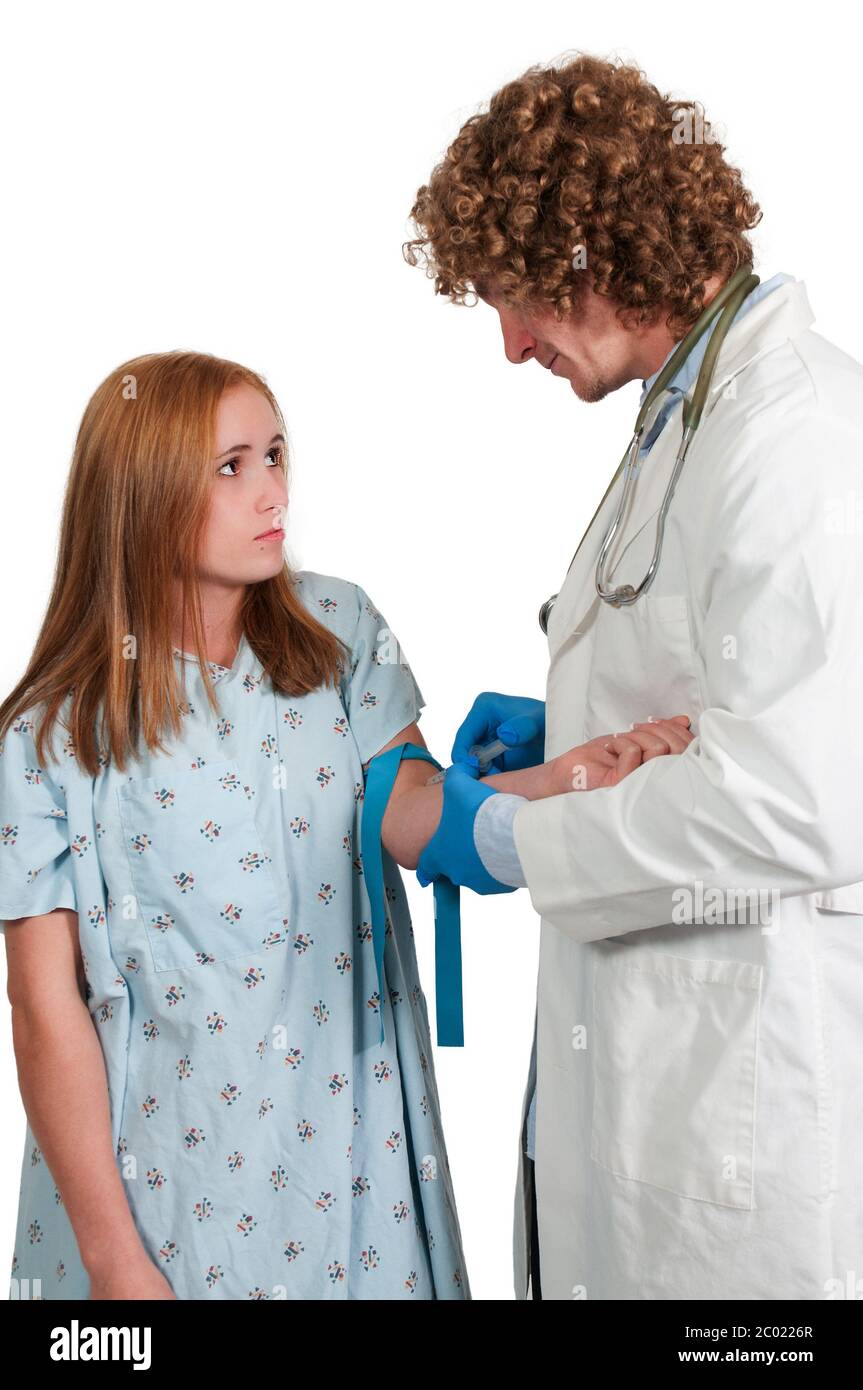 Doctor giving woman injection hi-res stock photography and images - Alamy