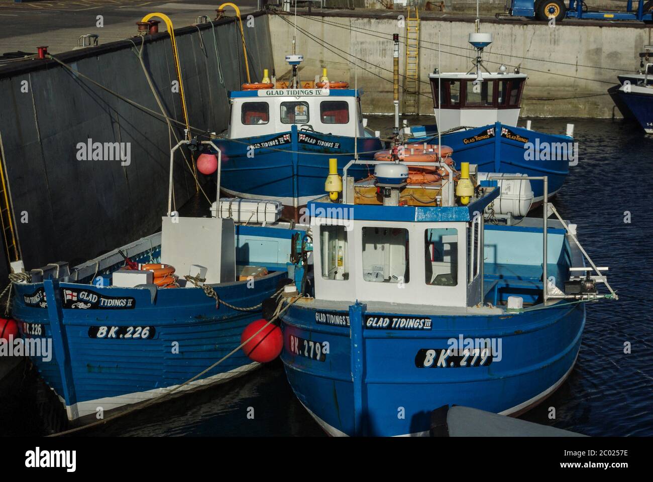 Seahouses Harbour, Northumberland, UK; Glad Tidings, Farne Islands excursion boats moored up. Stock Photo