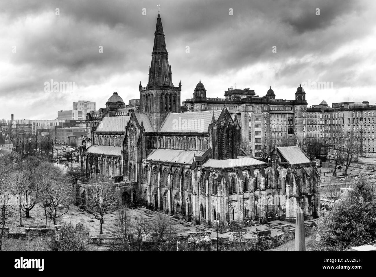 B&W image of Glasgow Cathedral with Glasgow Royal Infirmary in the background viewed from the Necropolis, Glasgow, Scotland, UK Stock Photo