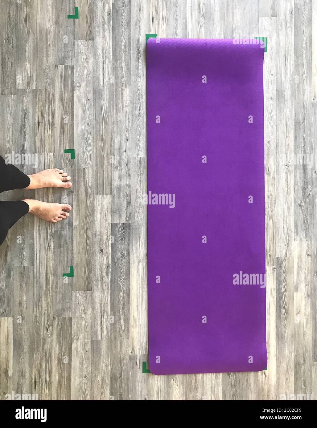 yoga mat is on special markings to maintain distance Stock Photo Alamy