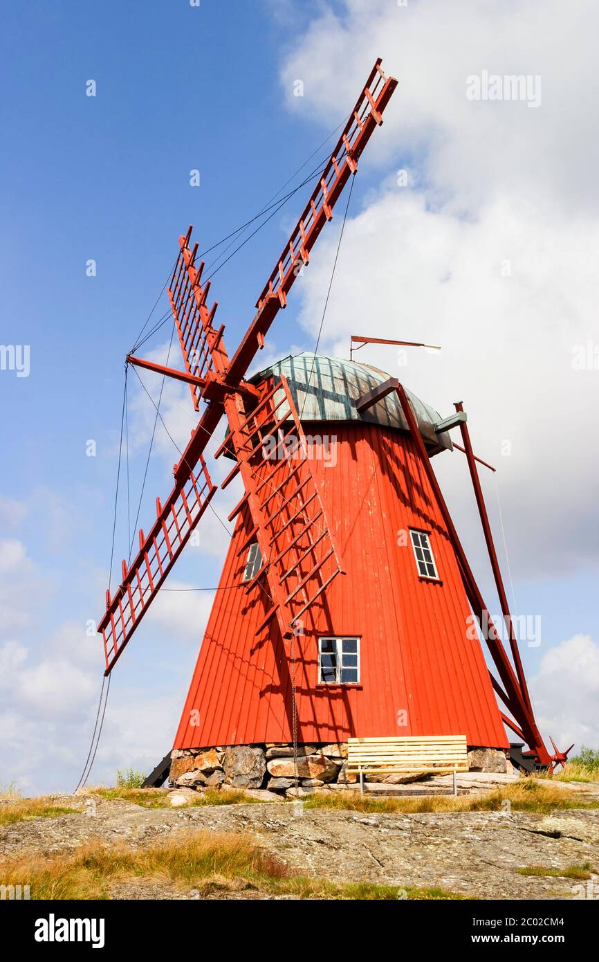 Red windmill on a hill Stock Photo