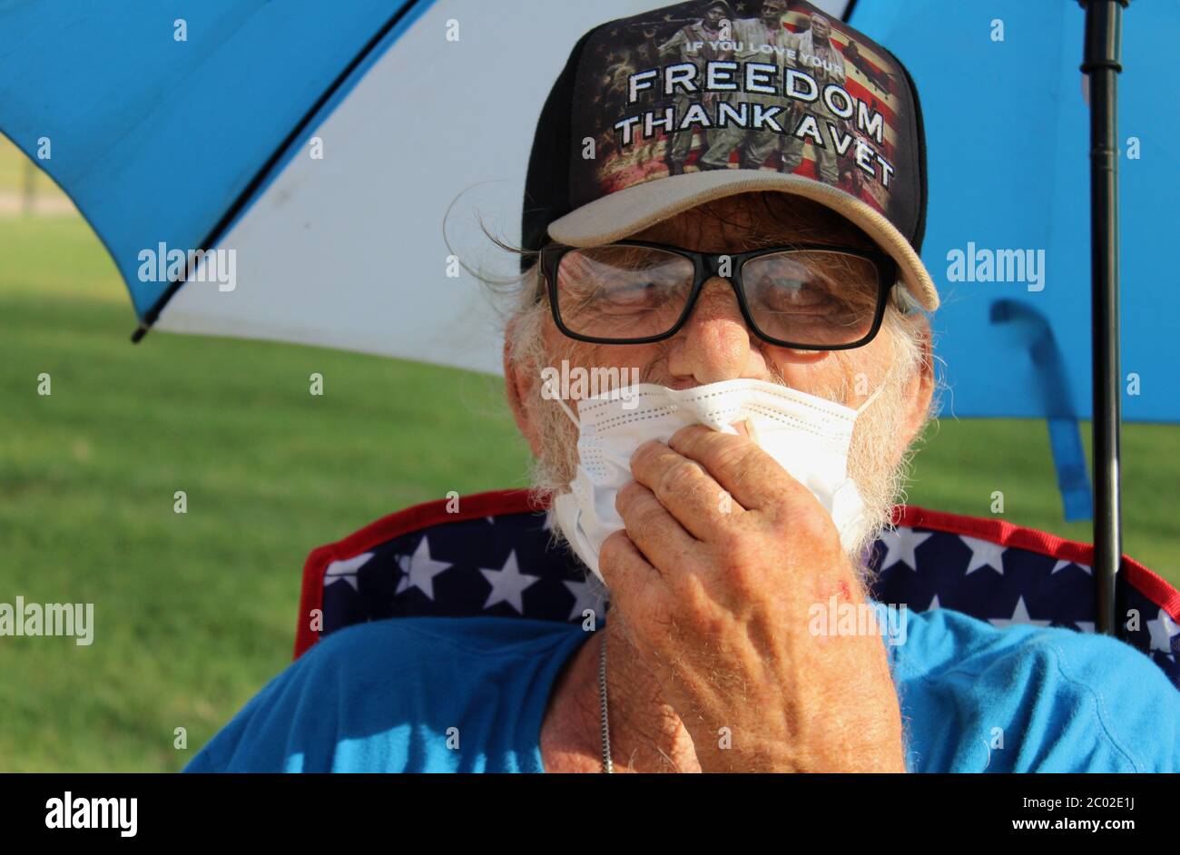 June 10, 2020, Washington D.C, District of Columbia, U.S: John Marr, a homeless Vietnam War vet, has been sitting across the street from the White House, since the first day of protests when men in unidentifiable military-type uniforms attacked innocent protestors, He says he is keeping an eye on President Trump, whom invited him into the White House, but he said, 'Hell no, you come out here if you want to talk to me!' .Hundreds continue to gather throughout the day and night on the newly named Black Lives Matter Street, in front of a heavy fenced White House, in the wake of the George Floy Stock Photo