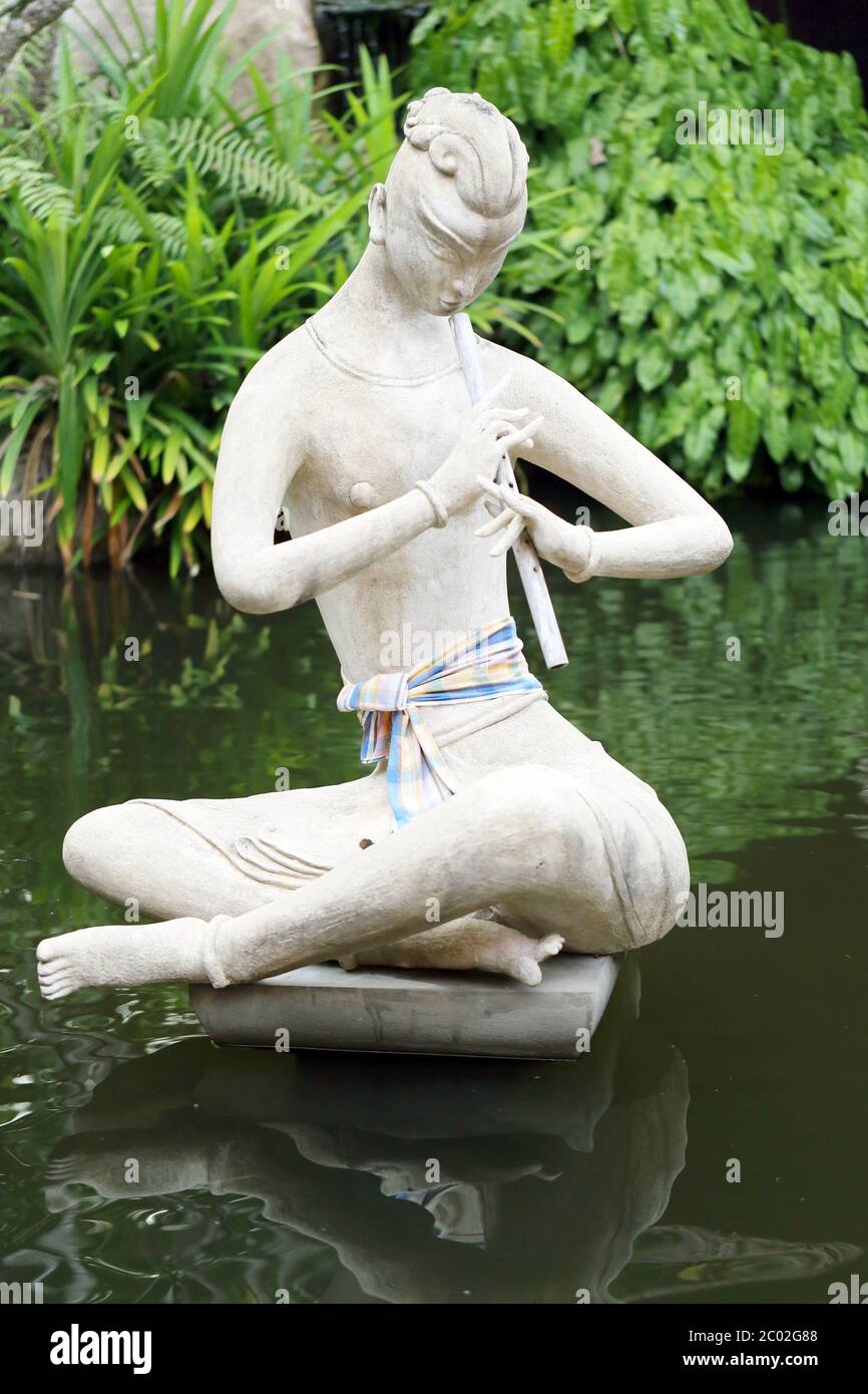 Boy playing the flute Stock Photo Alamy