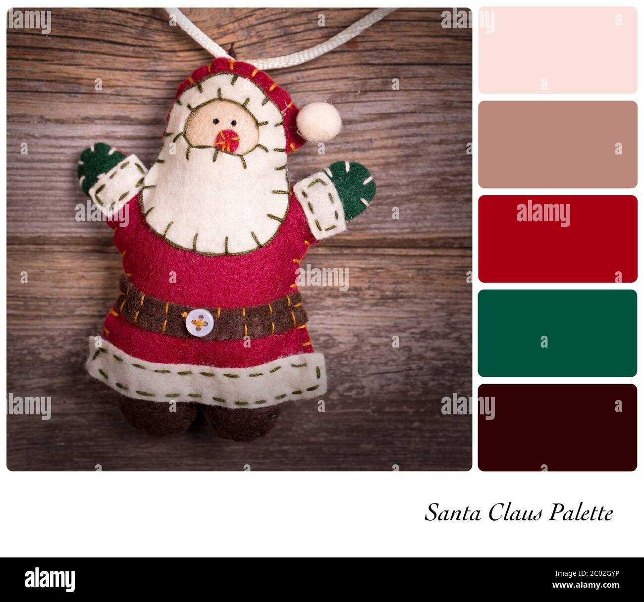 Retro style felt Santa Claus over old wood background. In a colour palette with complimentary ...