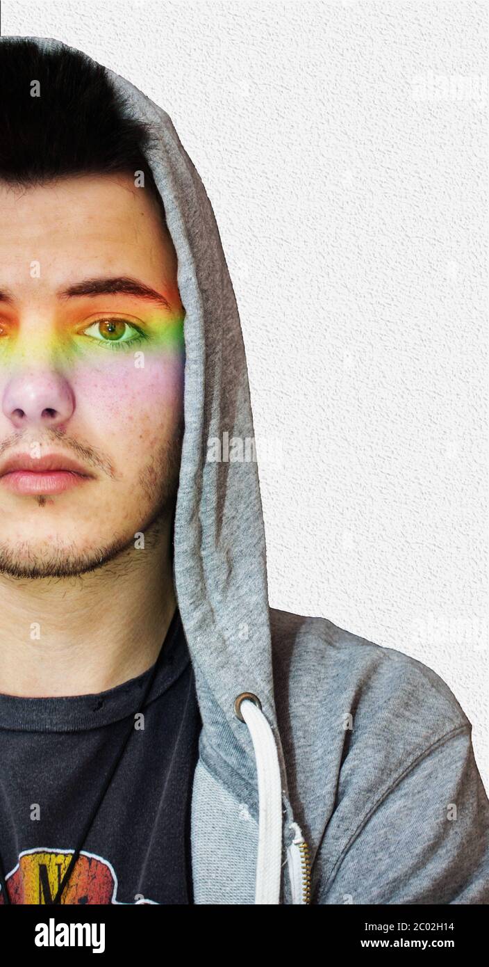 Boy with a rainbow in his face. Stock Photo