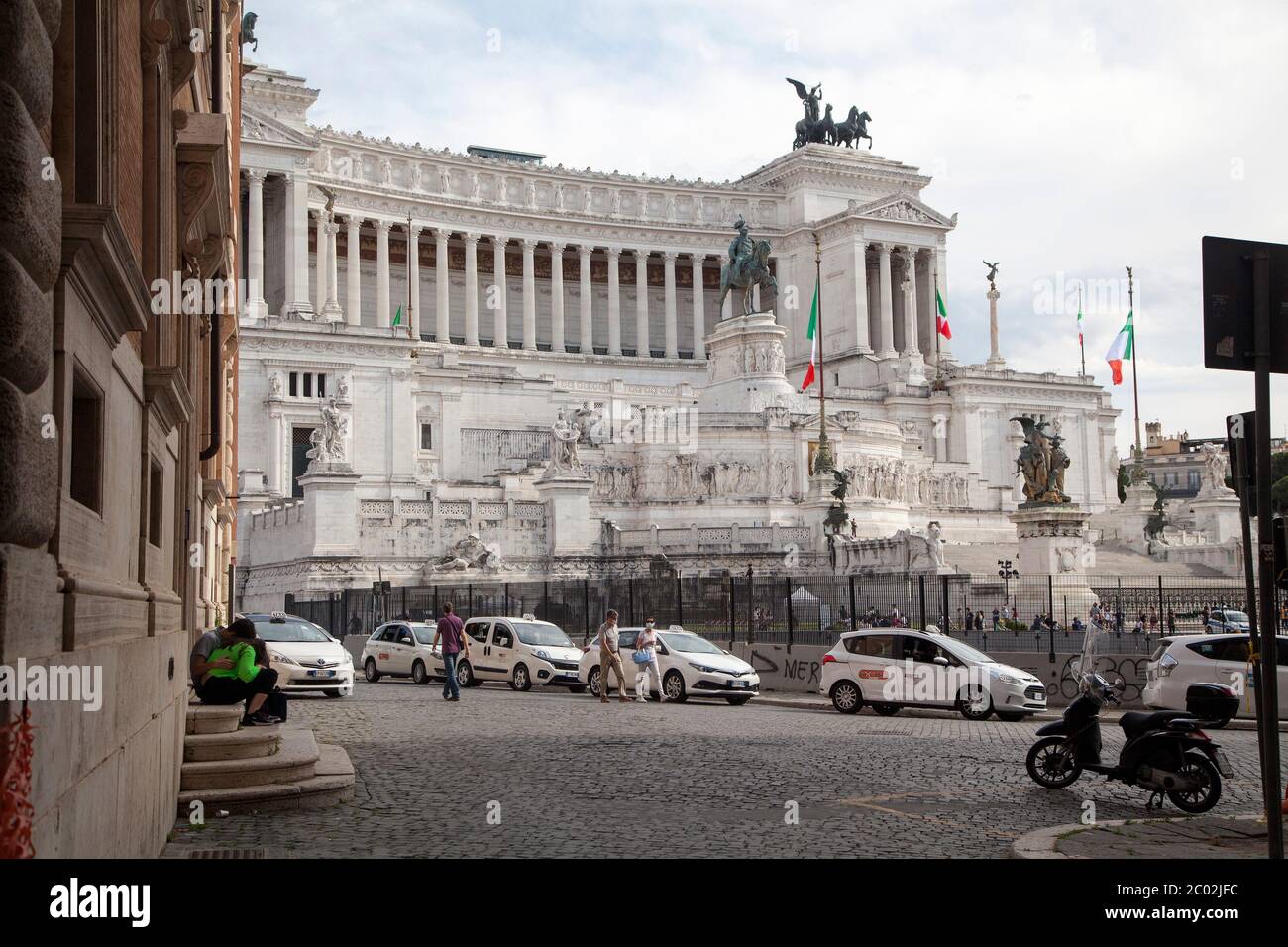 A queue of taxis wait for customers at the Imperial Forums (Fori Imperiali) near Piazza Venezia on June 02, 2020 in Rome, Italy as Italy starts to ease its lockdown, during the country's lockdown aimed at curbing the spread of the COVID-19 infection, caused by the novel coronavirus Stock Photo