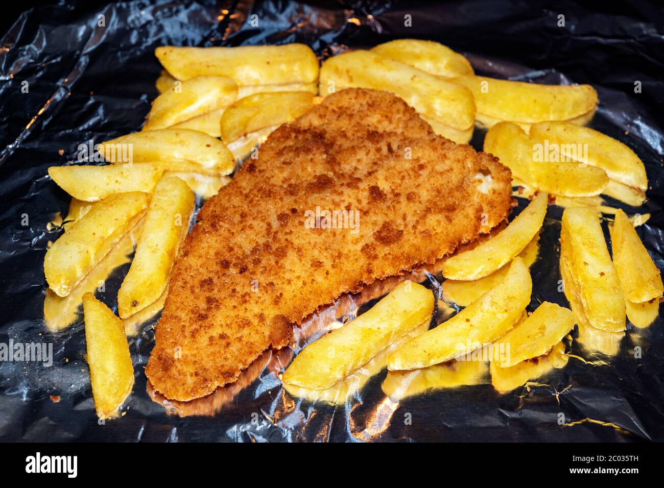 Fish and chips in the oven Stock Photo Alamy