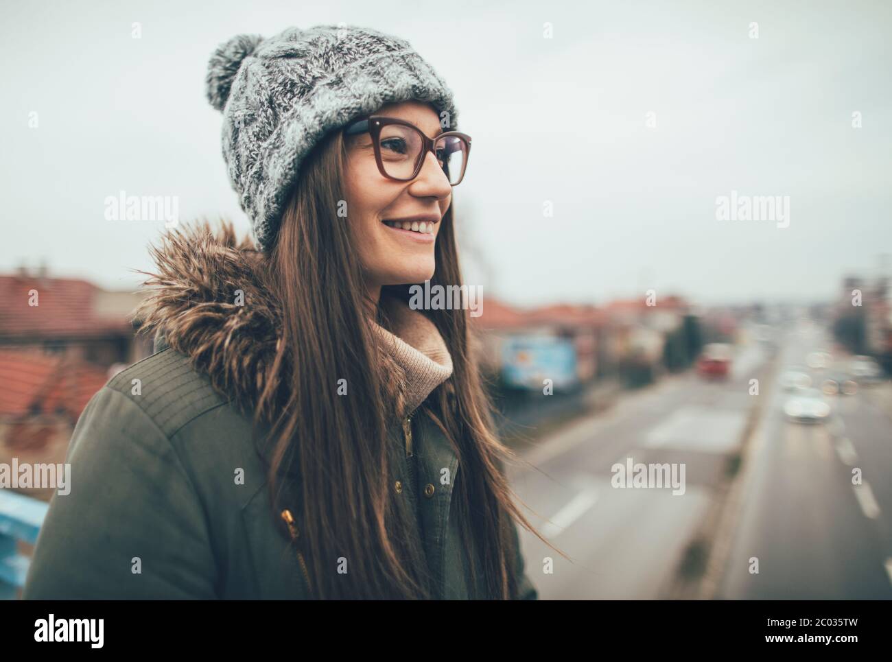 Portrait of pretty millennial girl with eyeglasses Stock Photo