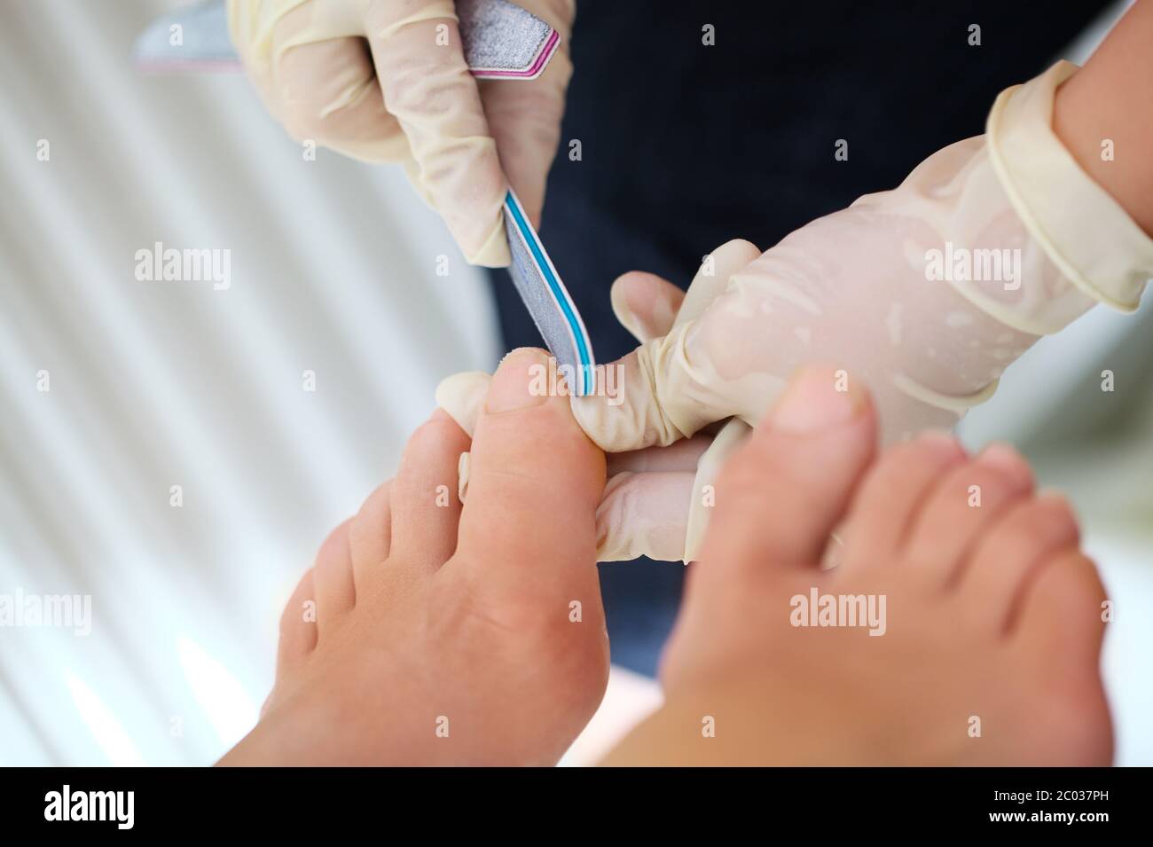 Woman feet during filing Stock Photo