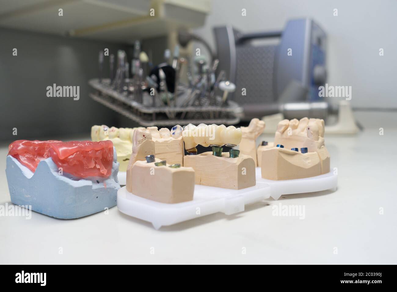 zirconia dental crowns on dental models in the dental laboratory Stock