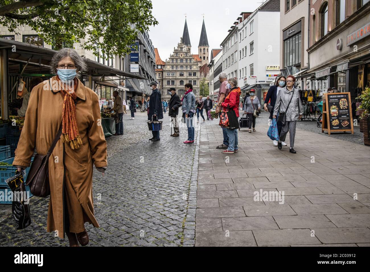 German people going about their everyday lives after the coronavirus lockdown restrictions are relaxed in Braunschweig, north-central Germany Stock Photo