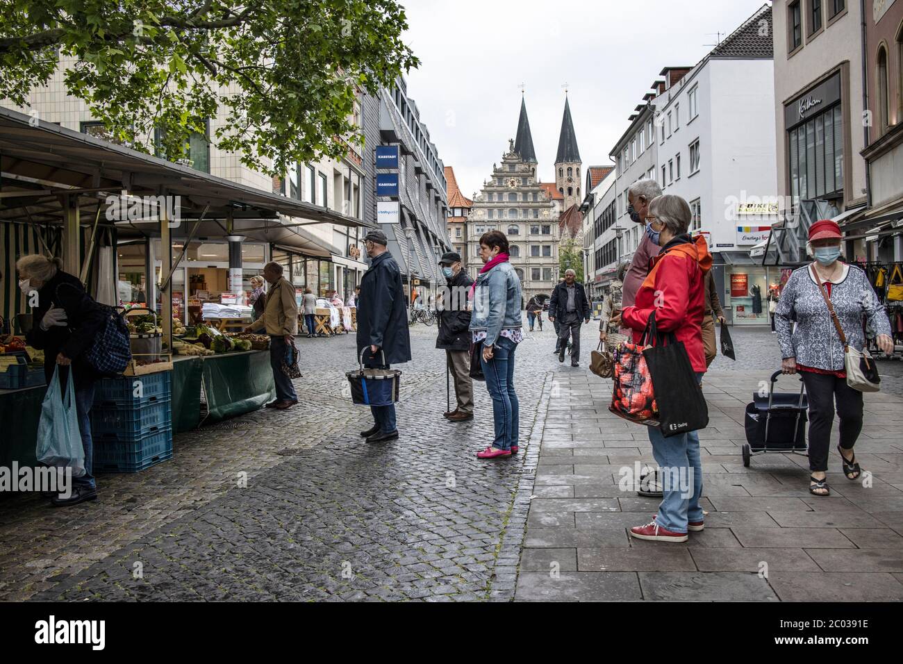 German people going about their everyday lives after the coronavirus lockdown restrictions are relaxed in Braunschweig, north-central Germany Stock Photo