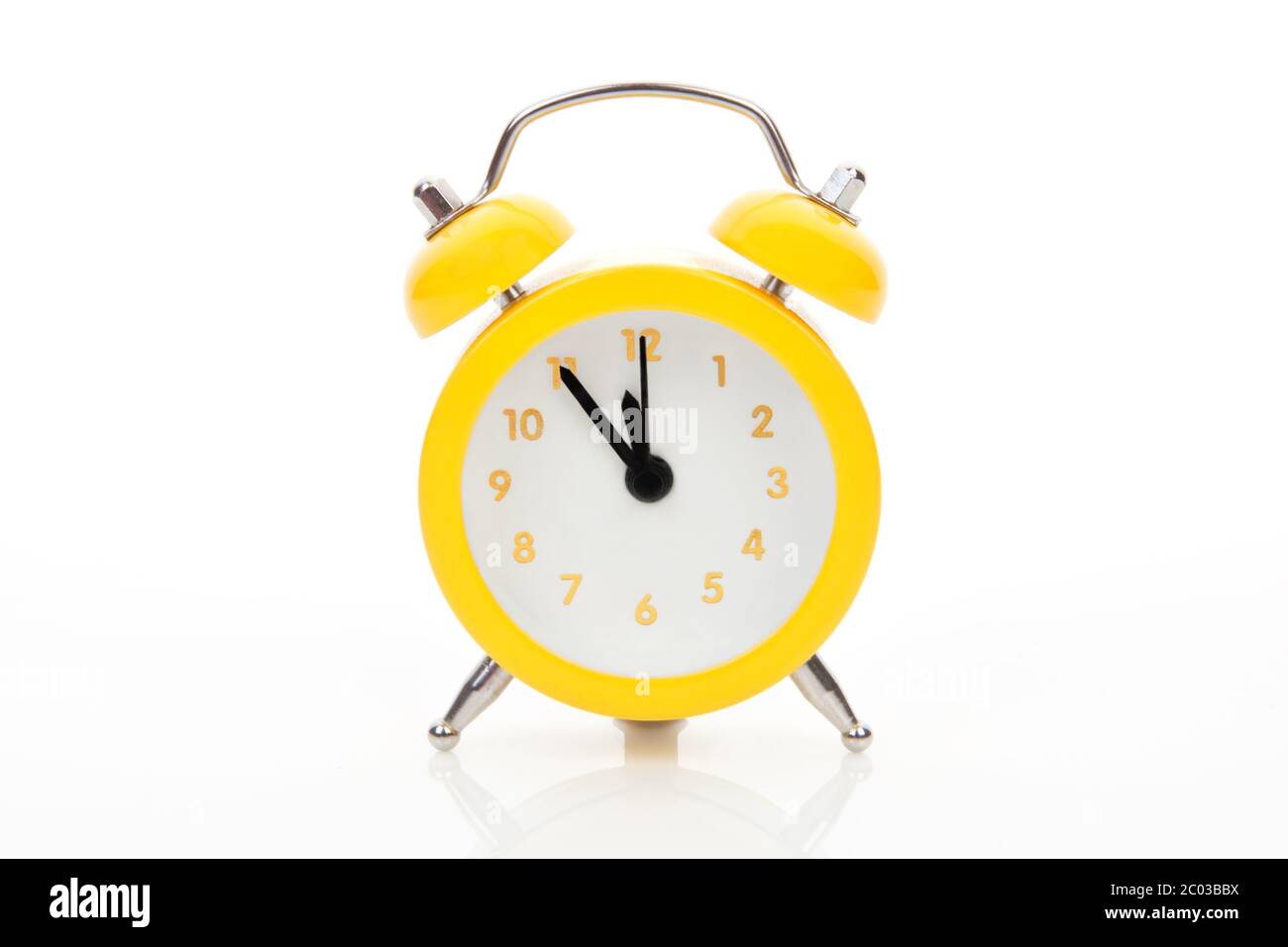 Alarm clock isolated on white Stock Photo - Alamy