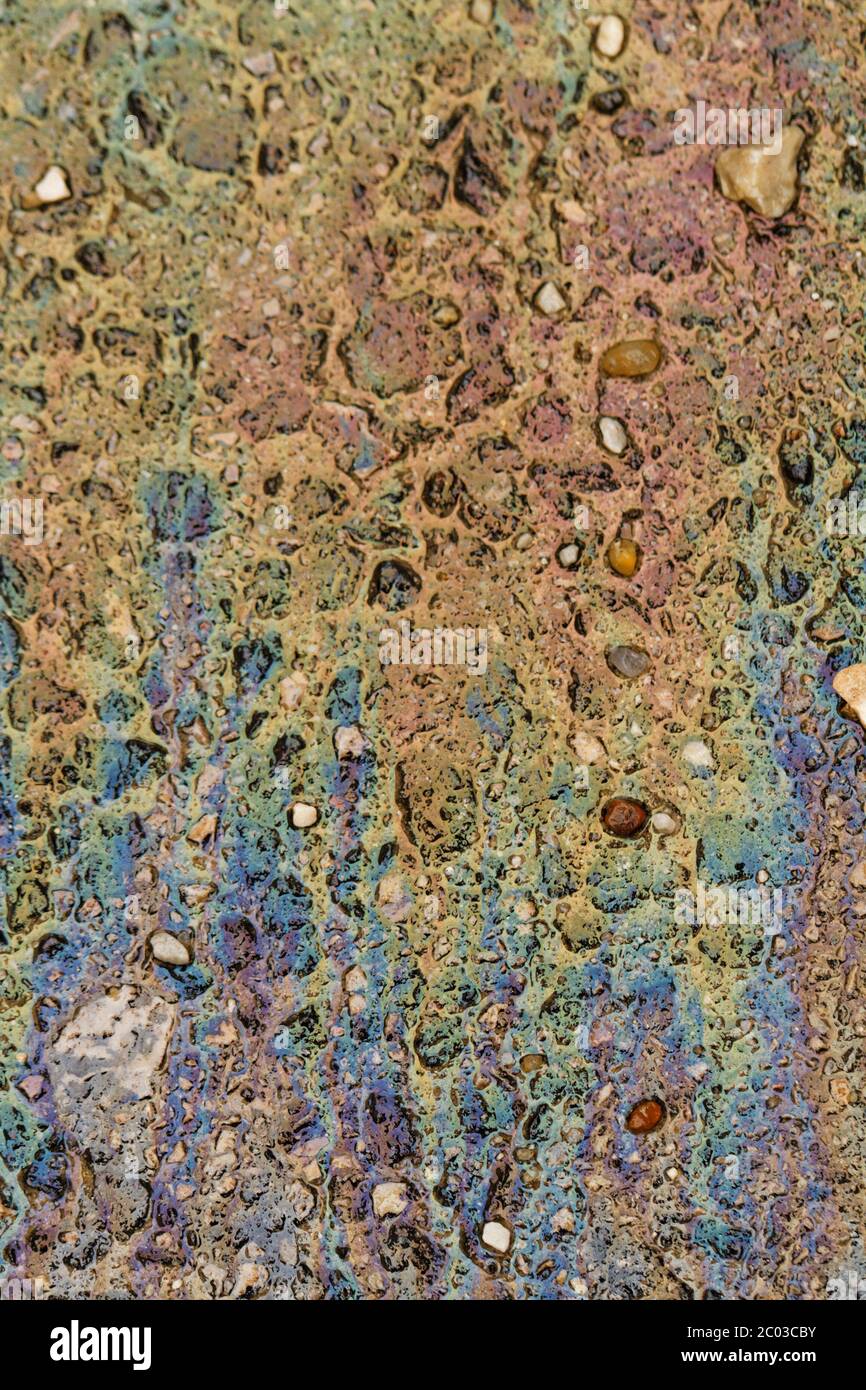 Photo of colorful oil spill on the road Stock Photo Alamy