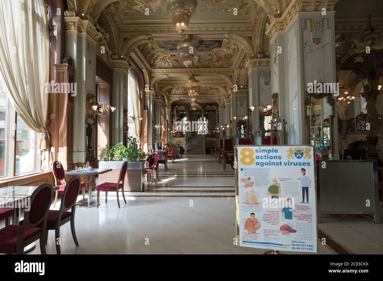 (200611) -- BUDAPEST, June 11, 2020 (Xinhua) -- Photo taken on June 10, 2020 shows the interior of reopened New York Cafe in Budapest, Hungary. Customers are allowed to enter the inside of cafe bars as the novel coronavirus pandemic has subsided and the COVID-19 restrictions were gradually lifted in Hungary. (Photo by Attila Volgyi/Xinhua) Stock Photo