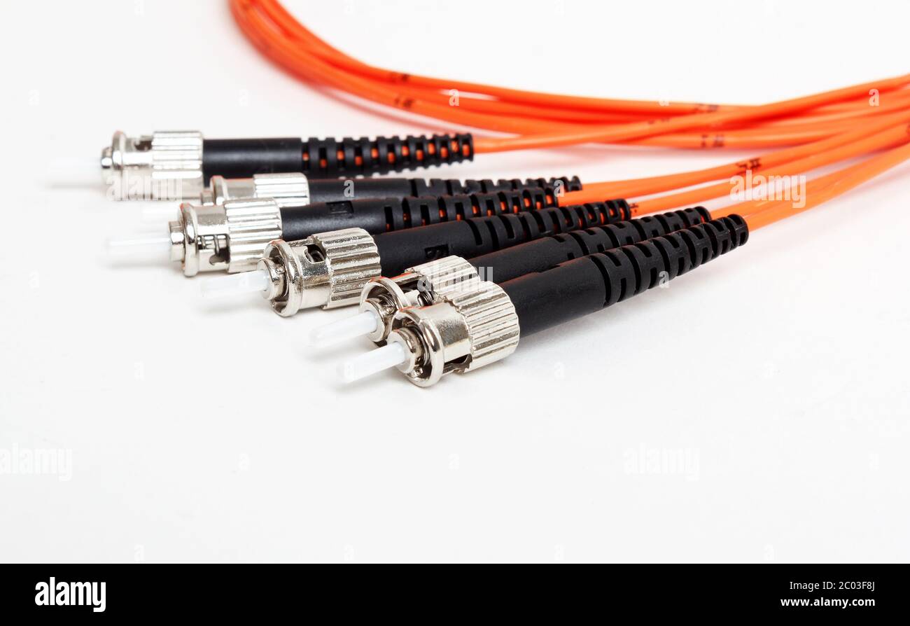 orange fiber optic ST connector patchcord Stock Photo Alamy