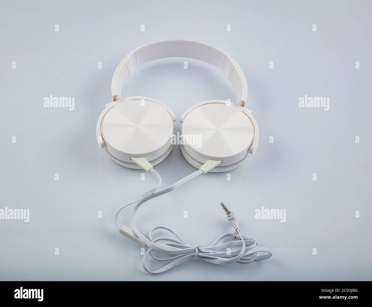 Stereo headphones. Top view of white headphones on white background ...