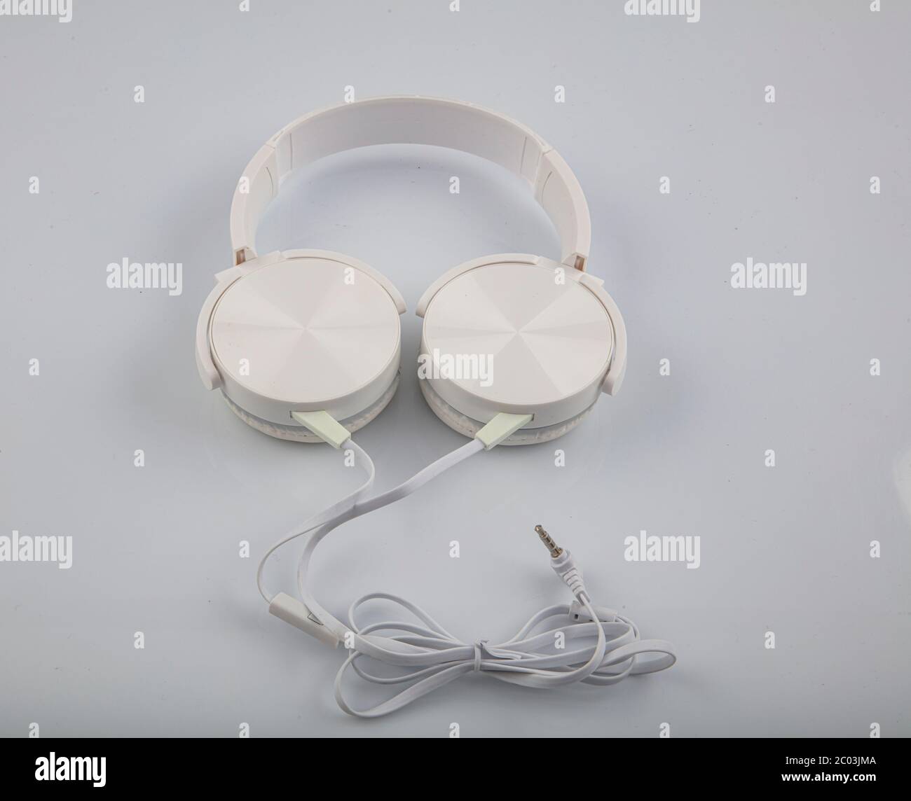 Stereo headphones. Top view of white headphones on white background ...