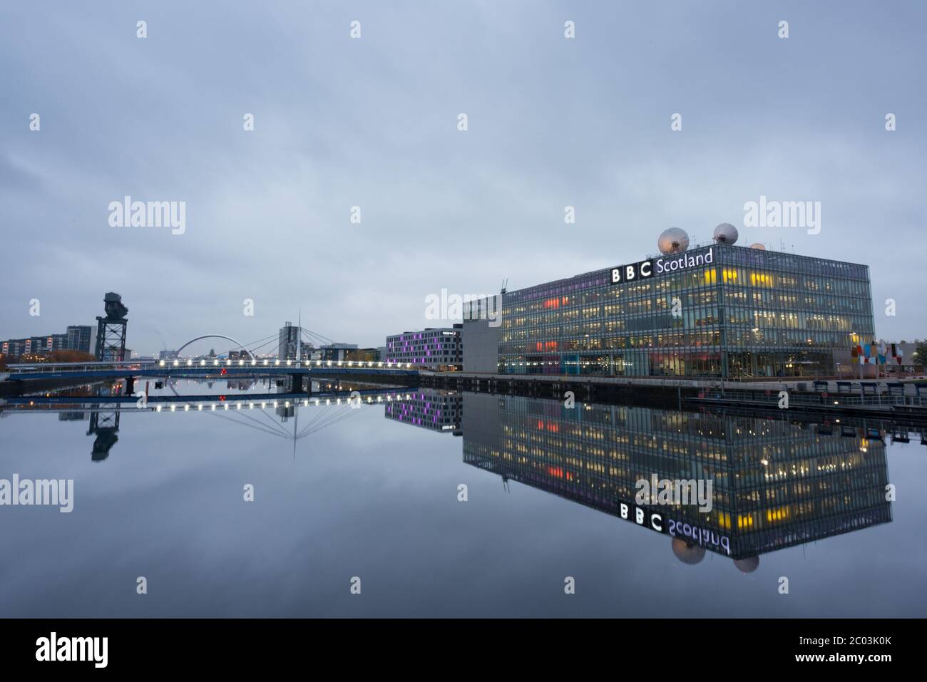 The BBC Scotland building reflected in the River Clyde in Glasgow, Scotland Stock Photo