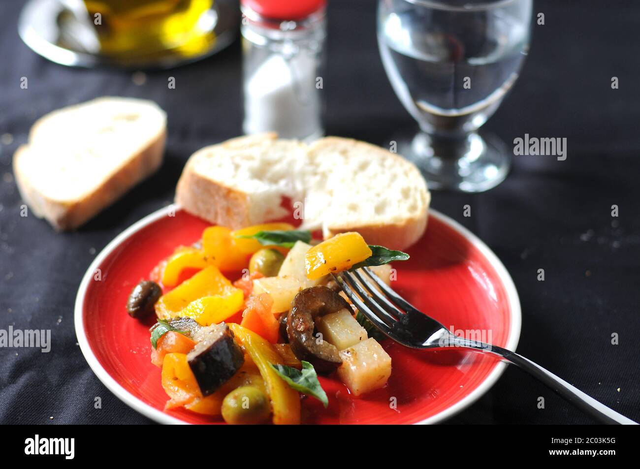 Caponata typical italian dish with potato pepper and tomato Stock Photo