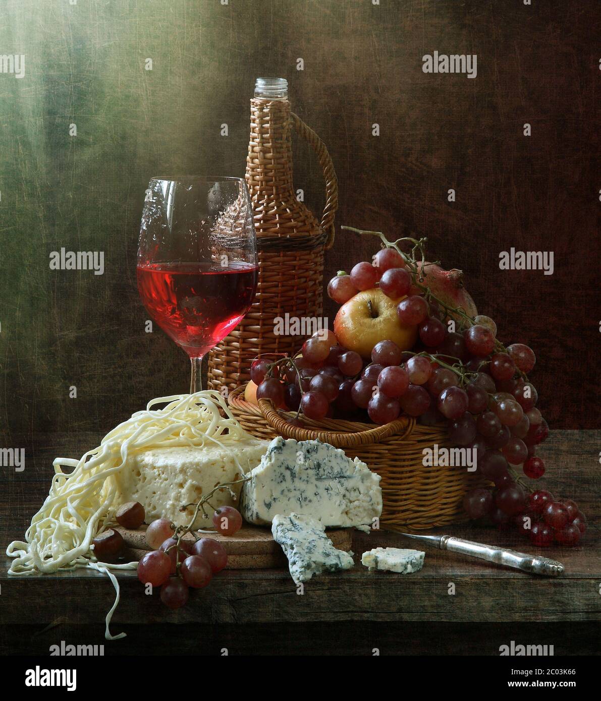 Still-life with red wine and cheese and fruit Stock Photo - Alamy