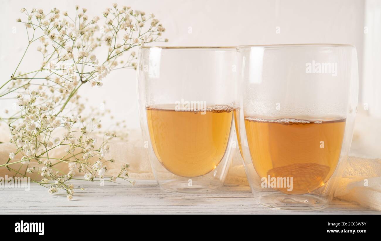 Morning romantic tea for couples. Black tea in regular glass cups. Hot tea in double wall cups. Double walled mugs Stock Photo