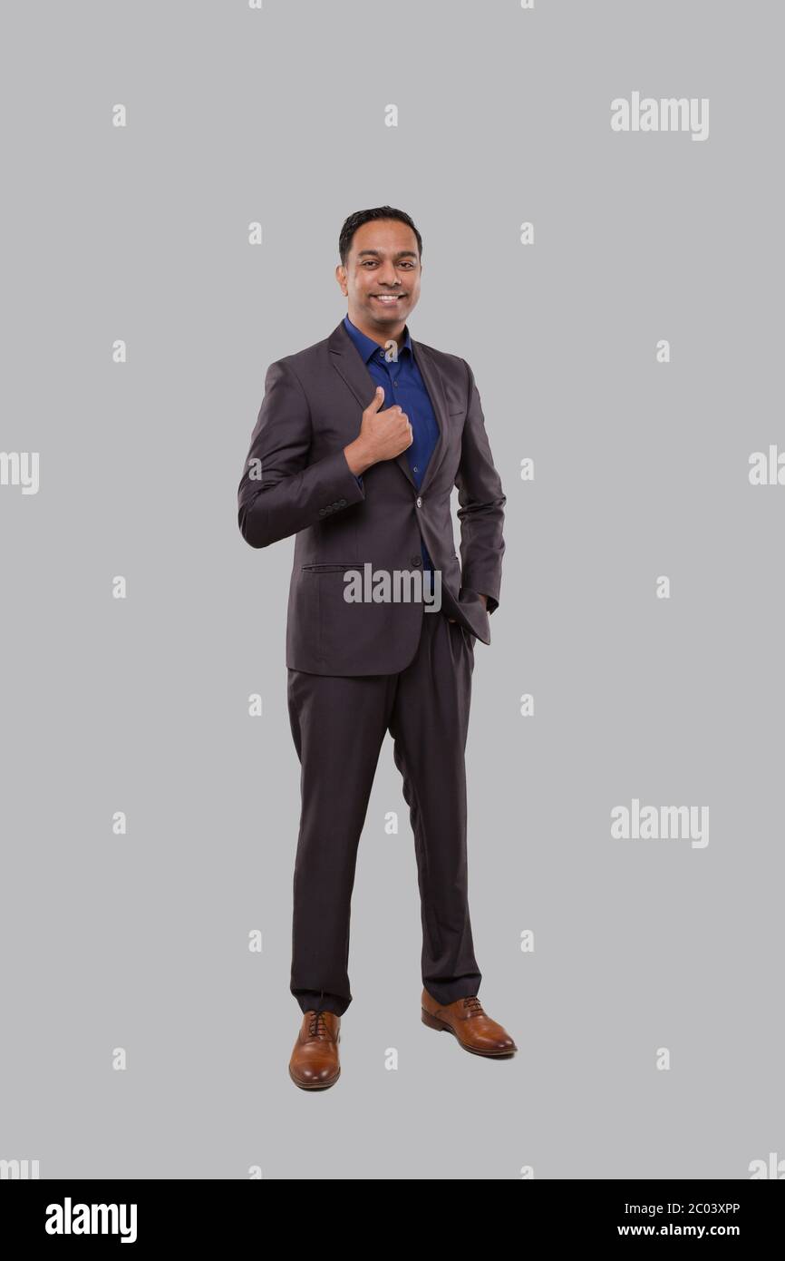 Indian business man standing pose hi-res stock photography and images ...