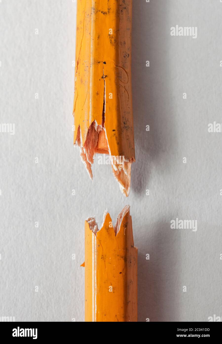 Broken pencil on a white background Stock Photo - Alamy