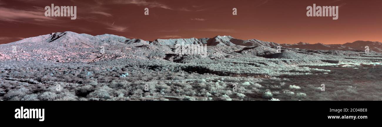 650nm Infrared Landscape panorama Image with mountains in Pinal County of Southern Arizona in the Desert vegetation of the Tucson area in Winter 2020 Stock Photo
