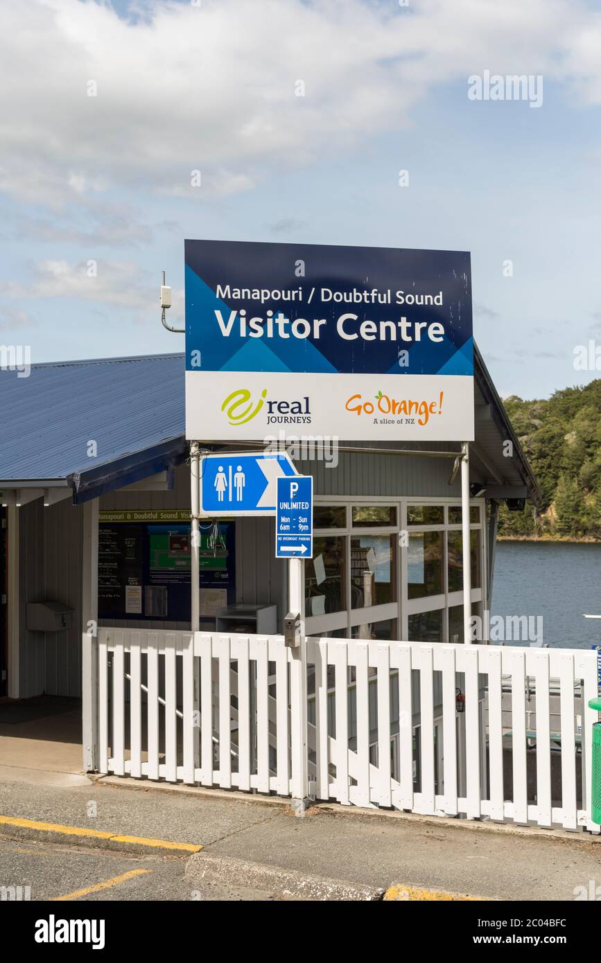 The Real Journeys ticket office at Pearl Harbour lake Manapouri New Zealand where you can buy tickets for boat trips Stock Photo
