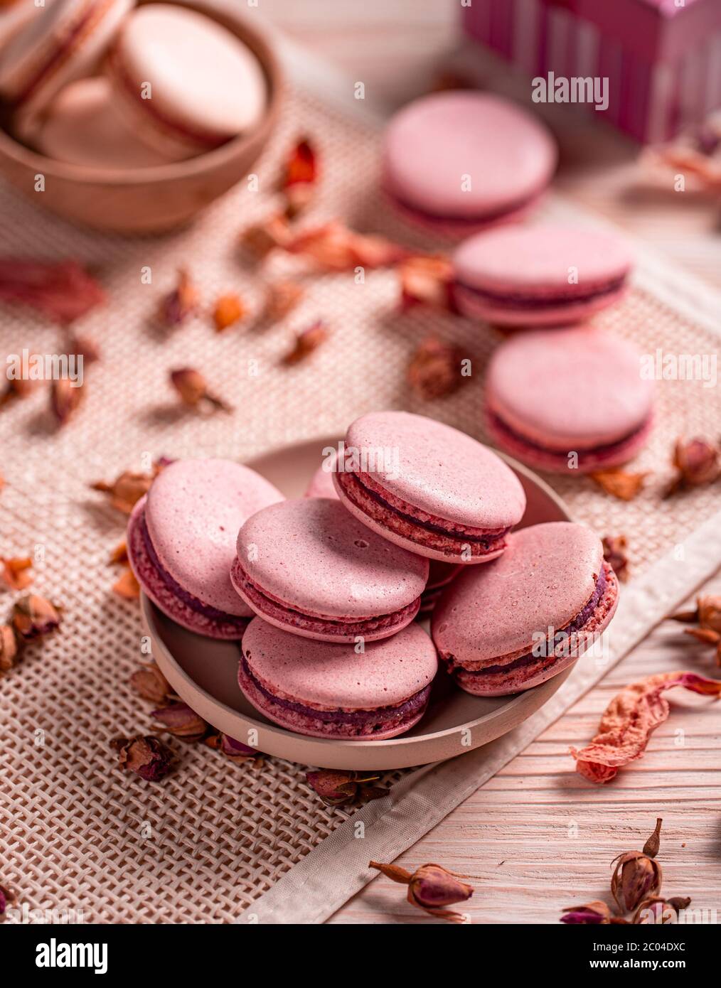 French sandwich cookie named French macaron in bowl Stock Photo